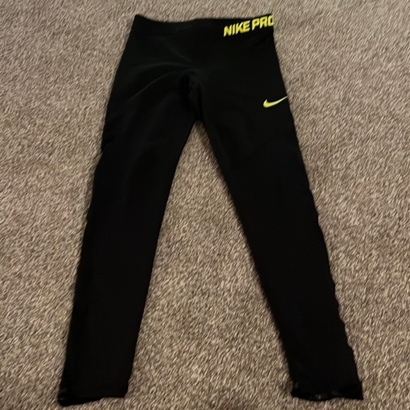 Nike Pants - Black Nike pro leggings with neon green writing size medium